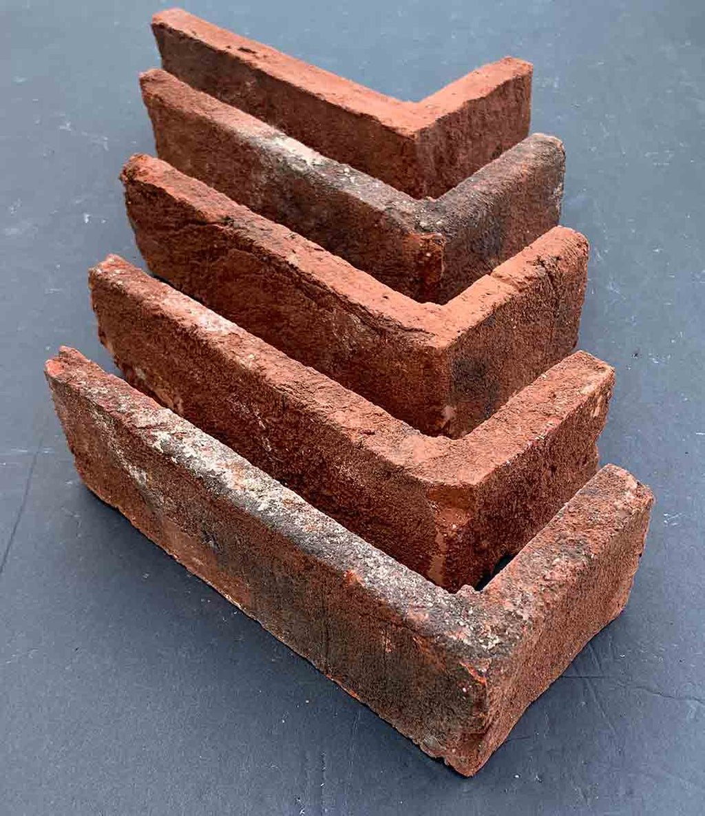 Modular Stained Thin Brick Veneer. Weathered Patina with Deep Terracotta tones &amp; black and white shades on the surface. 1/2″ in Thickness.