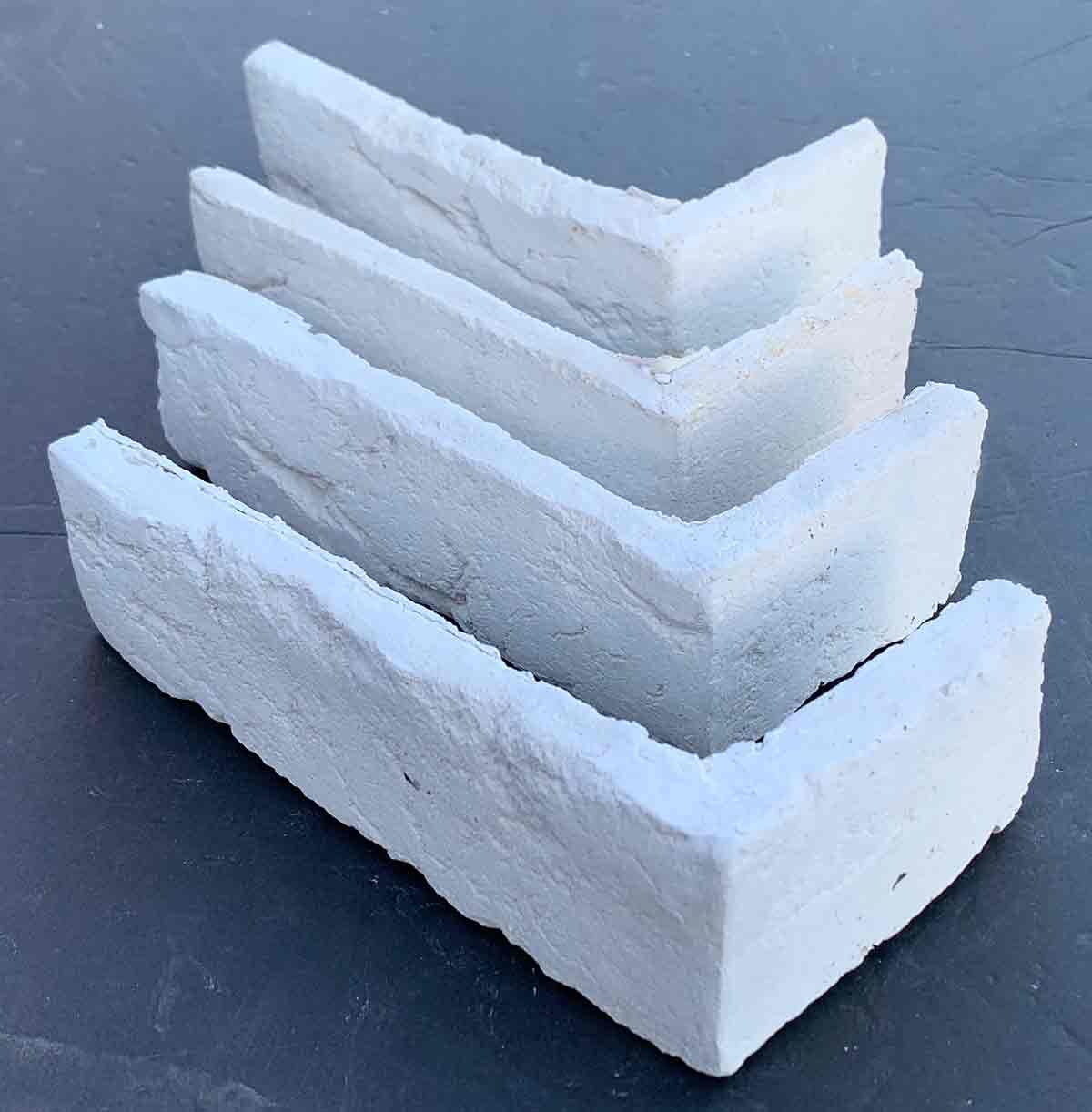 Renewed Antique Brick 2901. Warm White Brick Veneer. 1/2″ Thickness. Aged Texture with Tumbled Edges.