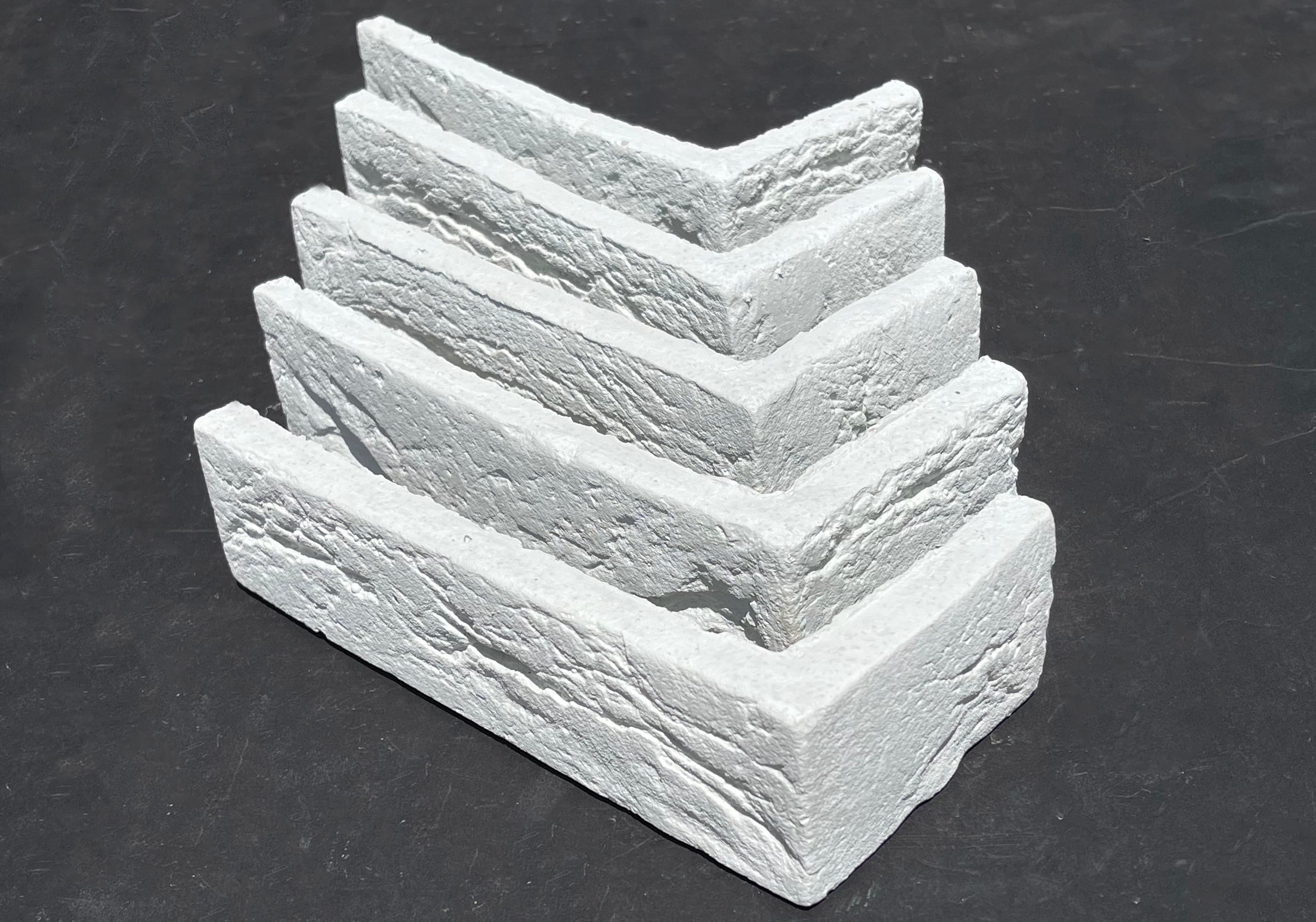 Aura Brick 1000. White Brick Veneer in Half-Inch Thickness. 2-1/4 by 8" in size. Weathered Style.