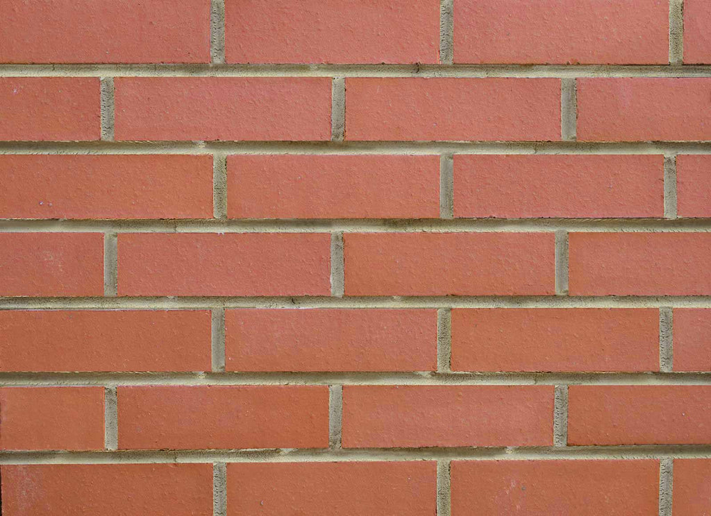 FLT05 - Smooth Red Thin Brick Veneer. Defined Corners with a Flat, Even Surface and Clean Finish. 2.55″ X 8.5″ in Size.