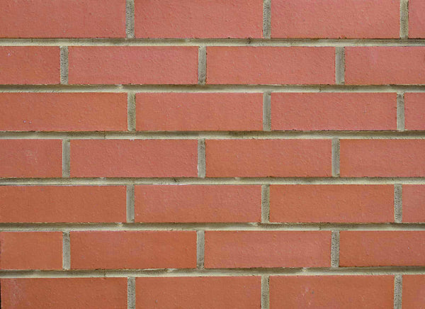 FLT05 - Smooth Red Thin Brick Veneer. Defined Corners with a Flat, Even Surface and Clean Finish. 2.55″ X 8.5″ in Size.