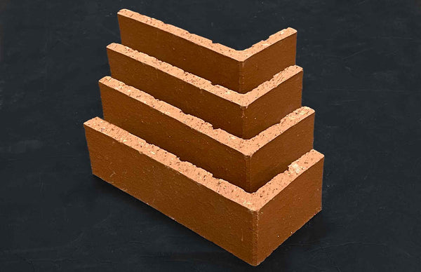 FLT05 - Smooth Red Thin Brick Veneer. Defined Corners with a Flat, Even Surface and Clean Finish. 2.55″ X 8.5″ in Size.
