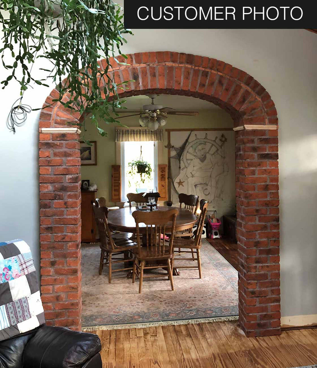 Bordeaux Modular Thin Brick Veneer. Deep Terracotta Background with Black Shades on Surface. Rough-Textured Finish with Vintage Character.