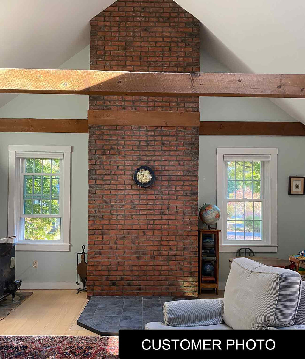 Bordeaux Modular Thin Brick Veneer. Deep Terracotta Background with Black Shades on Surface. Rough-Textured Finish with Vintage Character.