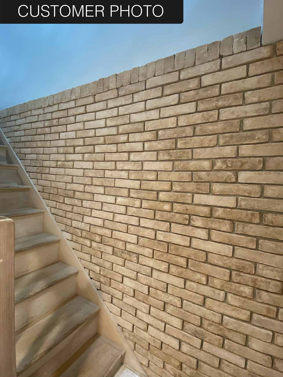 Modular Cream Thin Brick Veneer. Pale Ivory with Sandy-Hues. 1/2″ Thickness. Subtly Aged Surface with Distressed Corners.