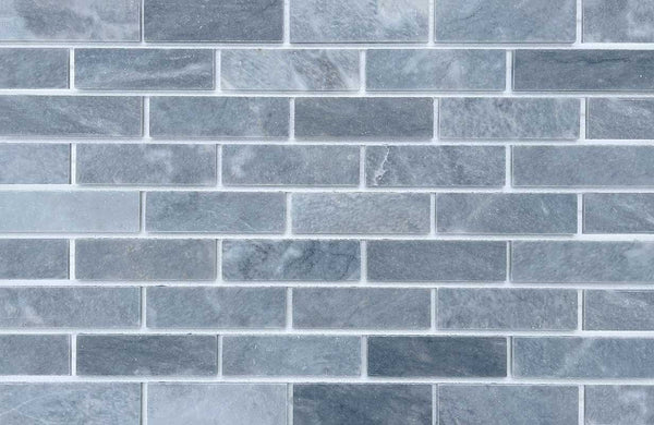 Marble Brick - Gray. Thin Brick Veneer Sliced from Real Marble. Smooth Surface with Soft Veining and Sharp, Square Edges.