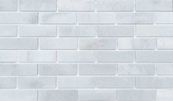 Marble Brick - White. Elegant Finish with Subtle Veining and Defined Corners. Thin Brick Veneer Sliced from Real Marble.