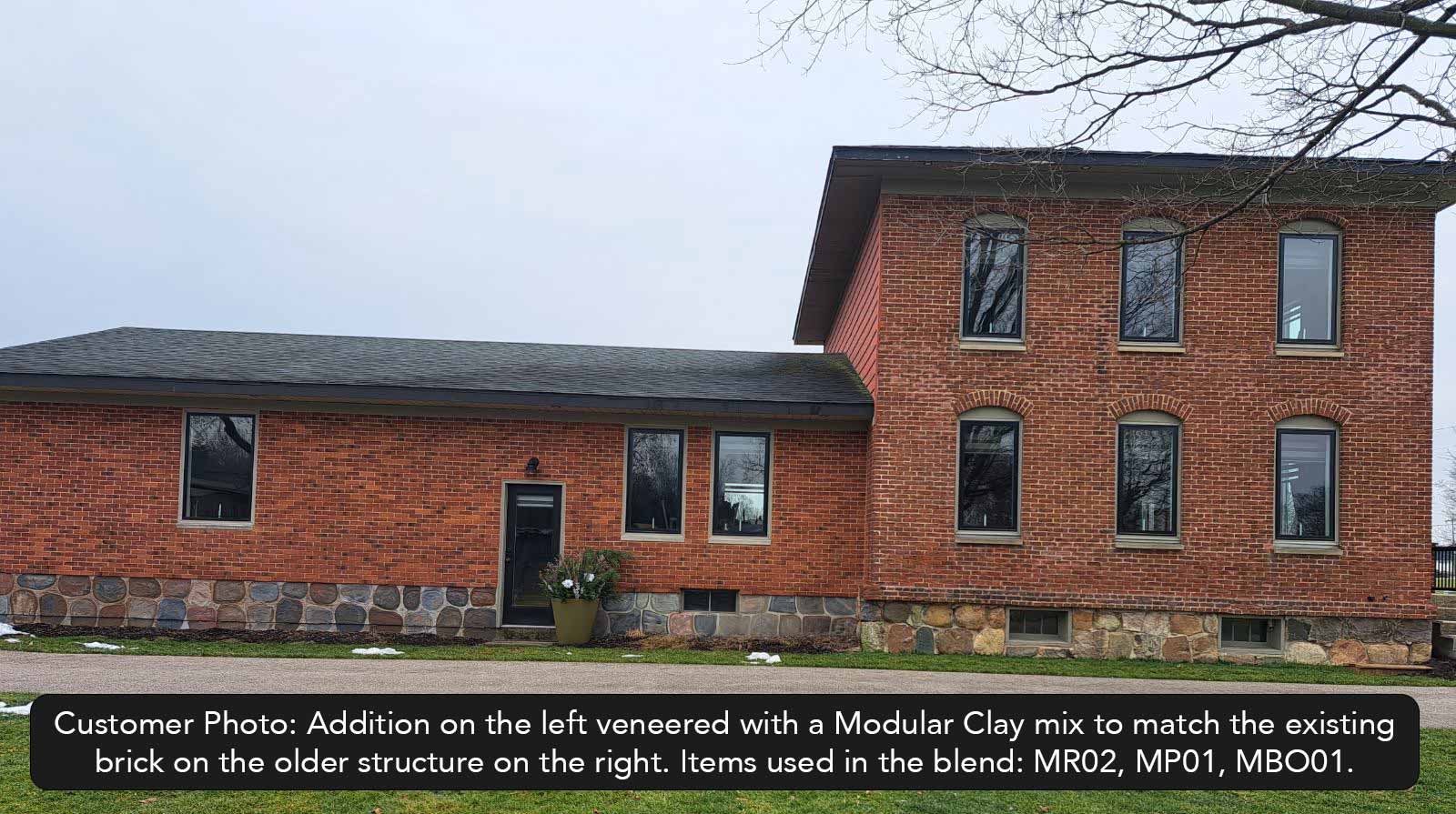 Bordeaux Modular Thin Brick Veneer. Deep Terracotta Background with Black Shades on Surface. Rough-Textured Finish with Vintage Character.