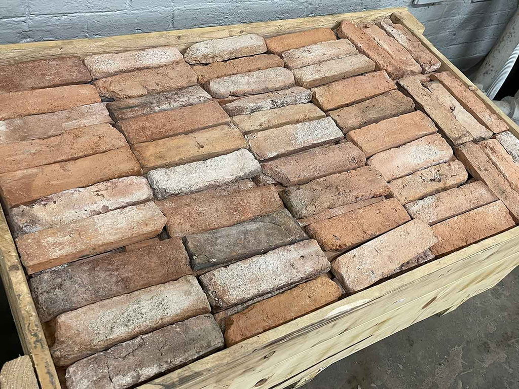Real Reclaimed Thin Brick Veneer. Genuine Brick Slices from Historic Buildings. Naturally Weathered with Authentic Aged Character. Random Tones and Sizes.
