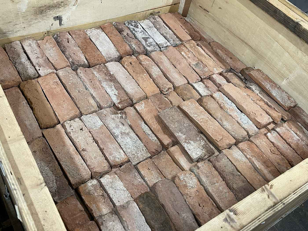 Real Reclaimed Thin Brick Veneer. Genuine Brick Slices from Historic Buildings. Naturally Weathered with Authentic Aged Character. Random Tones and Sizes.