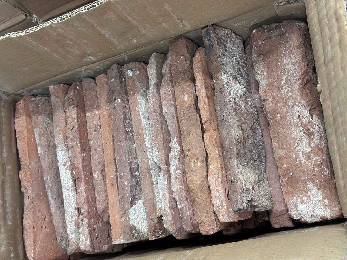 Real Reclaimed Thin Brick Veneer. Genuine Brick Slices from Historic Buildings. Naturally Weathered with Authentic Aged Character. Random Tones and Sizes.